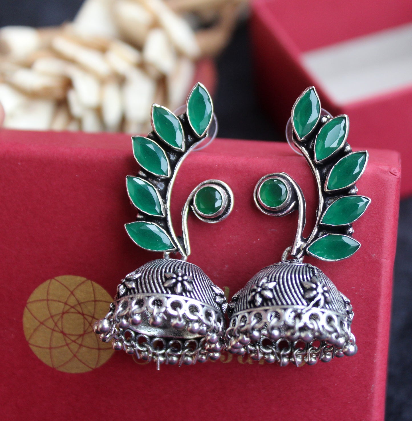 Oxidized German Silver Jhumki Earrings with Green Stones - Beaded Treasures