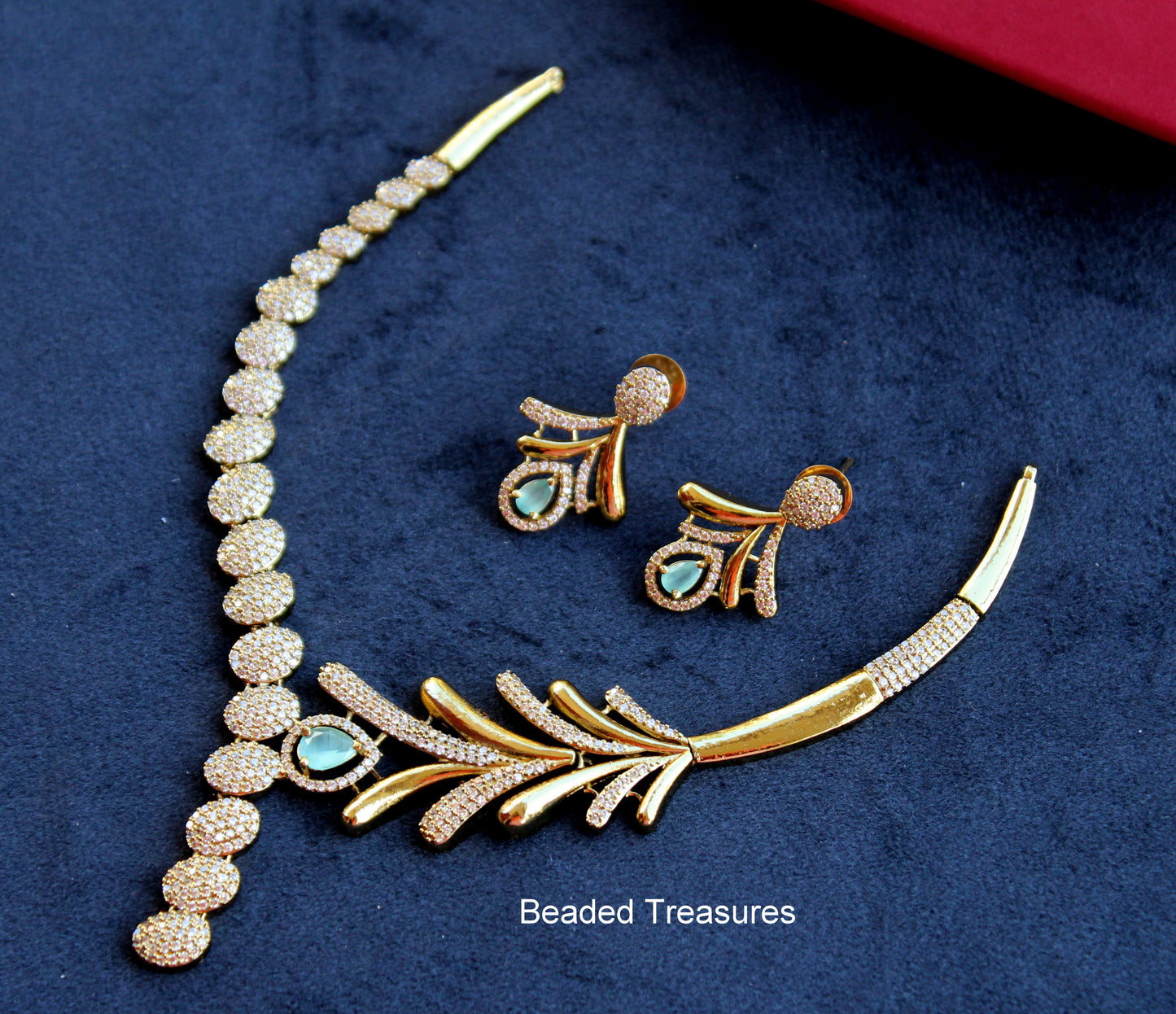 Feather Design AD Necklace Set with Light Blue Stone Accents - Beaded Treasures