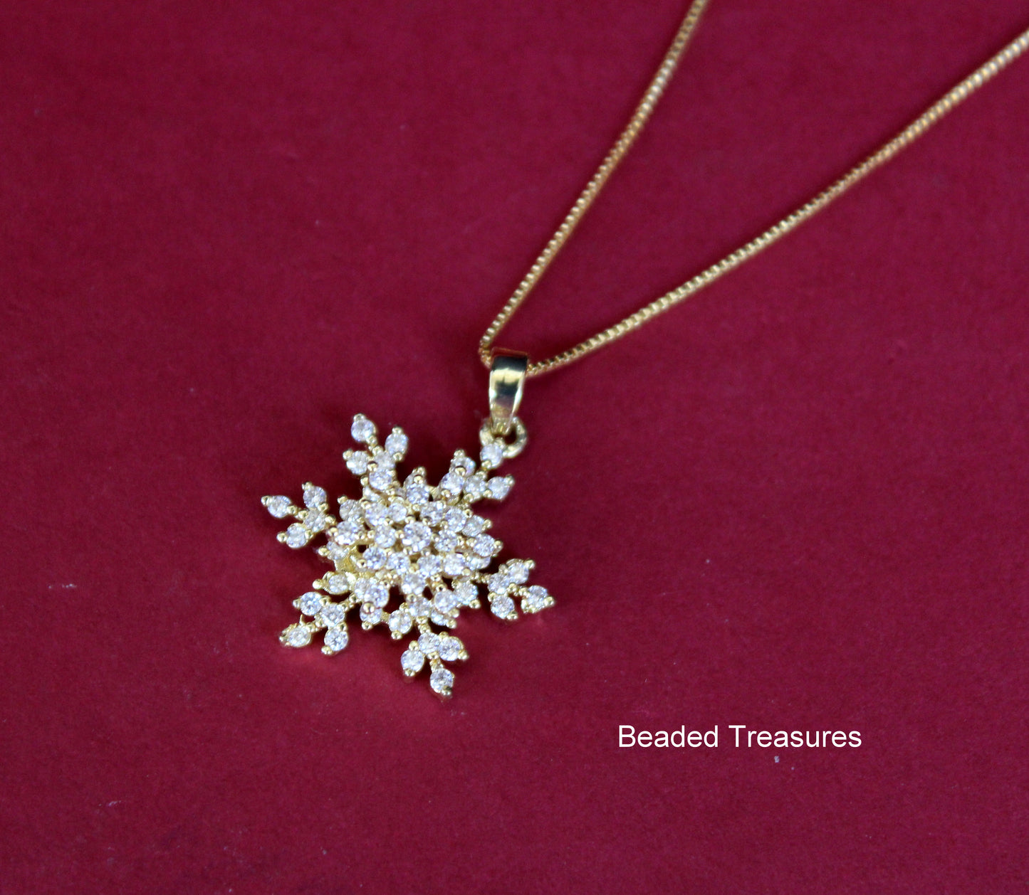Gold-Toned Snowflake Pendant Necklace - Beaded Treasures