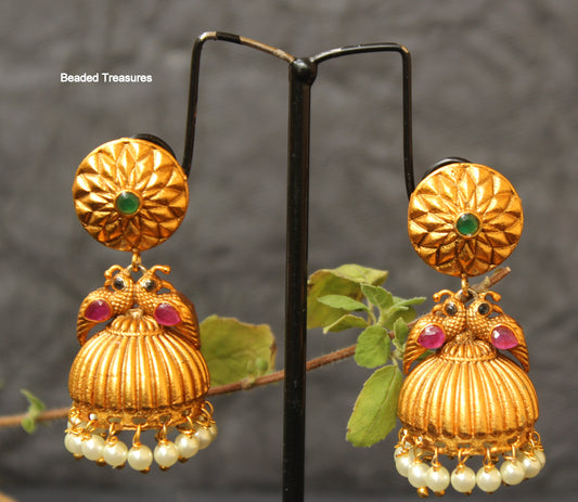 Royal Matte Gold Finish Peacock Jhumka Earrings with Emerald, Ruby & Pearls - Beaded Treasures