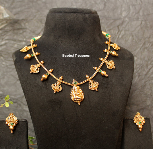 Elegant Matte Gold Finish Lakshmi Devi Thread Necklace Set - Beaded Treasures